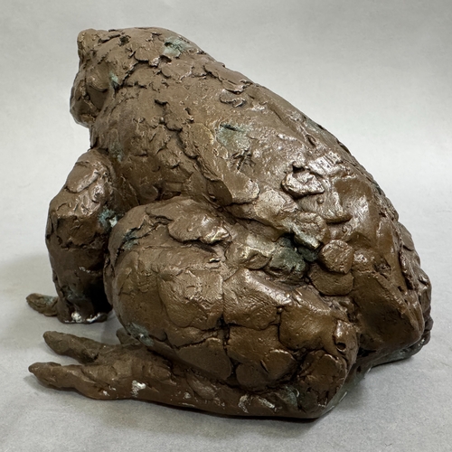 57 - A bronze sculpture of a toad, impressed monogram ES within a crown, to the underside, 19cm wide x 14... 