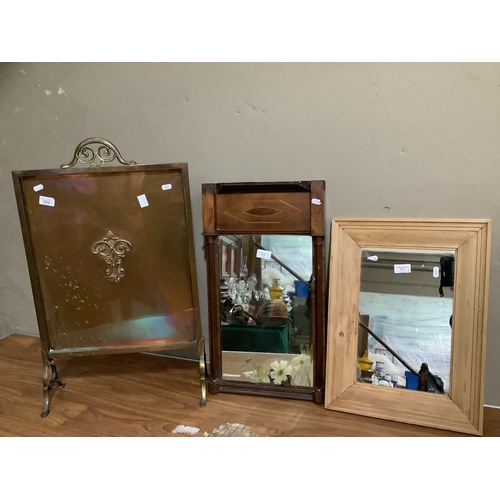 332 - A Victorian copper fire guard, a mahogany inlaid wall mirror and a rectangular modern pine mirror