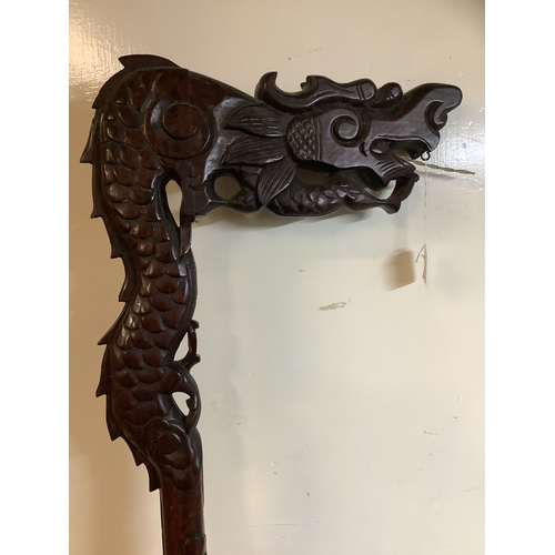 53 - An early 20th century Chinese carved hardwood dragon standard lamp (without electrical fitting), on ... 