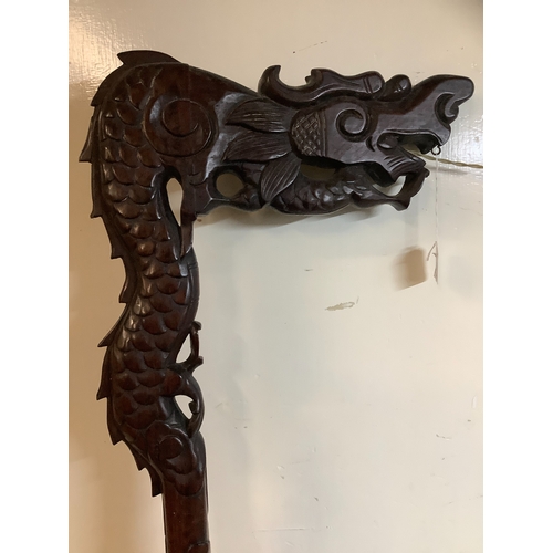 53 - An early 20th century Chinese carved hardwood dragon standard lamp (without electrical fitting), on ... 