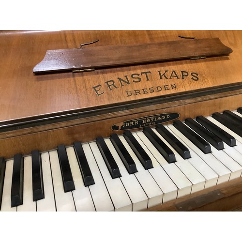 366 - An Ernst Caps walnut upright piano, the upright inlaid with satinwood floral detail having two brass... 