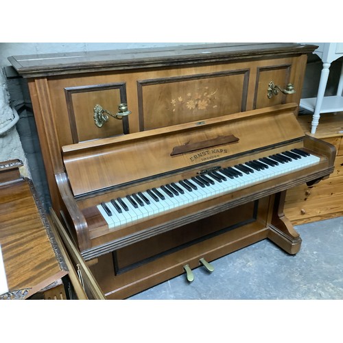 366 - An Ernst Caps walnut upright piano, the upright inlaid with satinwood floral detail having two brass... 