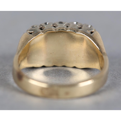 213 - A DIAMOND RING c1970, the brilliant cut stones set in three rows in line, in yellow and white metal ... 
