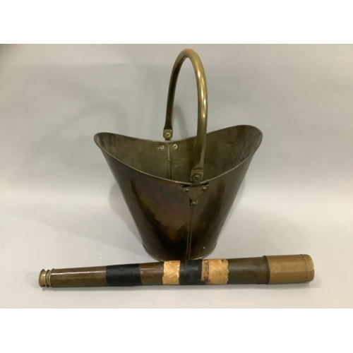 89 - A brass coal bucket with swing handle, approx. 50cm with handle, together with a two draw telescope ... 