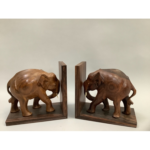 200 - A pair of hardwood elephant bookends, an agate swan, modern barometer and a smaller pair of elephant... 