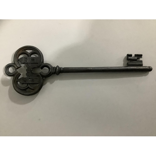 21 - A large iron key with pierced quatrefoil terminal with gateway named 'Klatovy' and on the reverse 'N... 