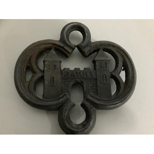 21 - A large iron key with pierced quatrefoil terminal with gateway named 'Klatovy' and on the reverse 'N... 