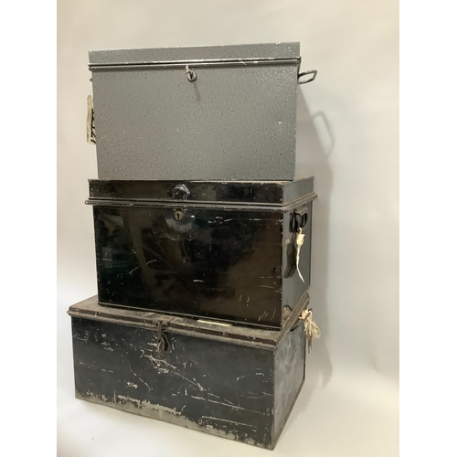 133 - A grey metal two handled deed box with key and two vintage black, tin deed boxes with side carrying ... 