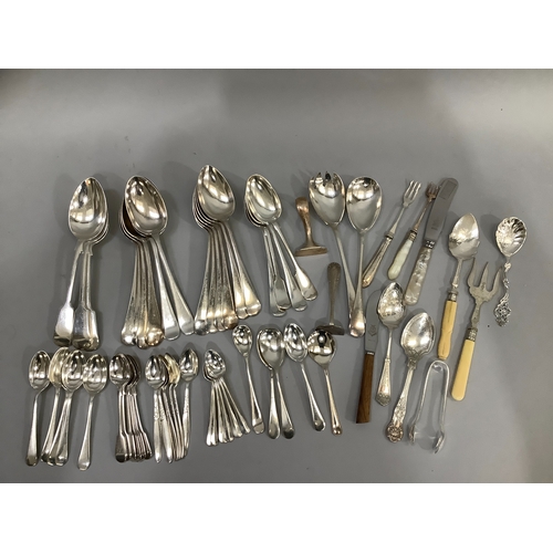 173 - A quantity of silver plated cutlery including sixteen table spoons in pairs, three, and one together... 