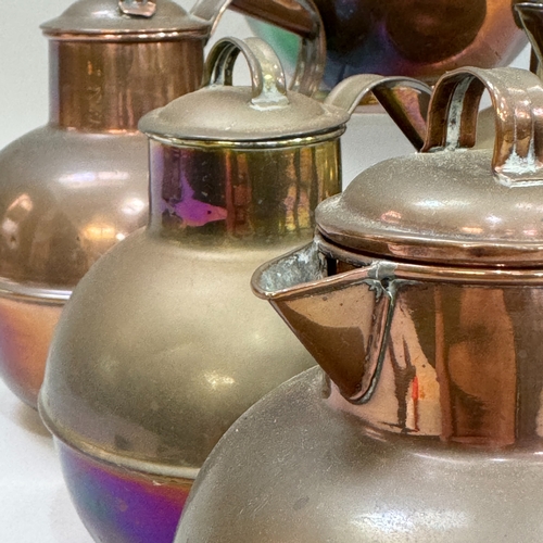 206 - Six copper Jersey cream jugs and one brass variously marked with makers from Guernsey and Jersey, fr... 