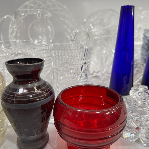 104 - Mixed cut and etched moulded glassware including vases, preserved pots, water jugs, fruit dishes, a ... 