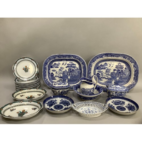 108 - A late Victorian/Edward VII china dessert service printed with a basket of flowers within a blue bor... 