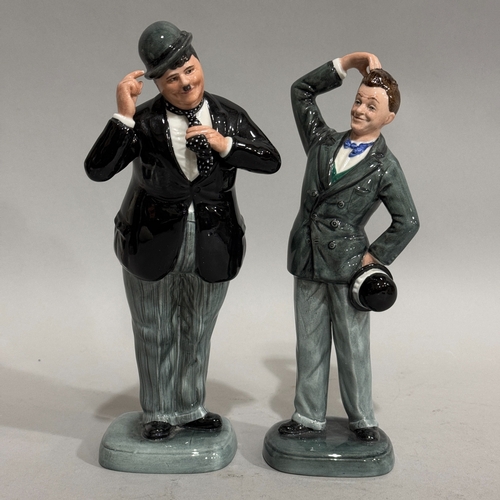 28 - A pair of Royal Doulton figures Stan Laurel and Oliver Hardy no.1754/9500 modelled by William K. Har... 