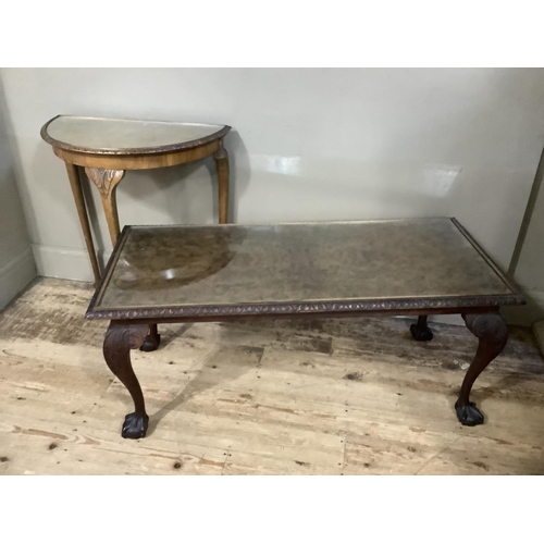 128 - A walnut coffee table on cabriole legs together with a walnut demi lune table