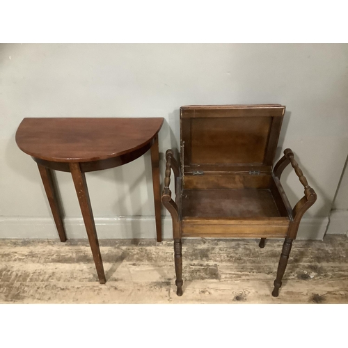 129 - A small mahogany demi lune side table together with a mahogany piano stool with lift up top