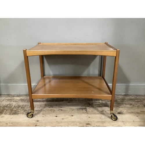 132 - A mid century teak two tier serving trolley