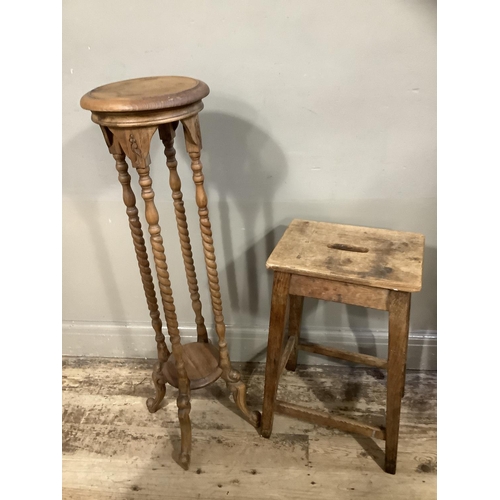 134 - A reproduction plant stand with turned legs together with a 1940s work stool