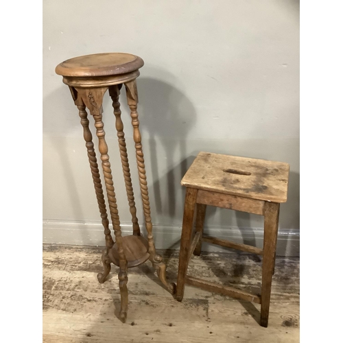 134 - A reproduction plant stand with turned legs together with a 1940s work stool