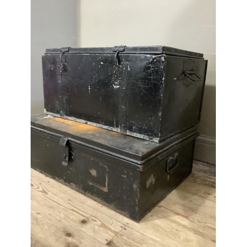 136 - A pair of tin metal travel trunks