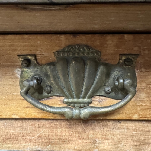 142 - A Victorian pine washstand having a marble top above single drawer, on turned legs and with pot boar... 