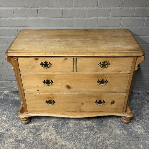 144 - A Victorian pine chest of drawers having two short above two long, serpentine shaped apron and on tu... 