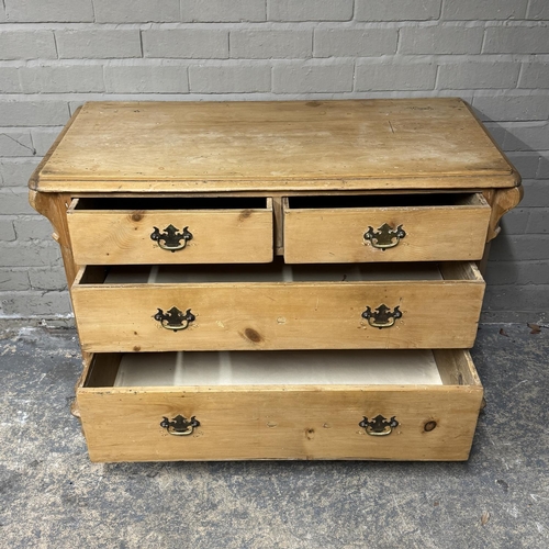 144 - A Victorian pine chest of drawers having two short above two long, serpentine shaped apron and on tu... 