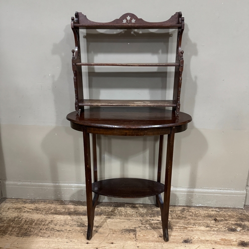 308 - An Edwardian mahogany window table together with an Edwardian mahogany hanging wall shelf of three t... 