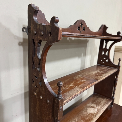 308 - An Edwardian mahogany window table together with an Edwardian mahogany hanging wall shelf of three t... 