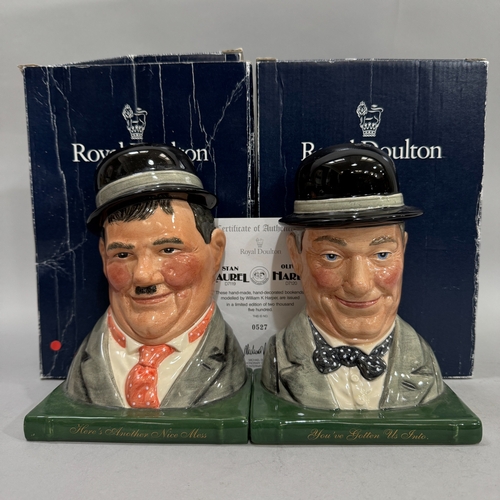 27 - A pair of Royal Doulton Laurel & Hardy bookends, modelled by William K. Harper no. 0527/2500, in pre... 