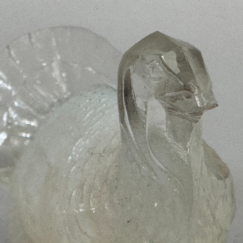 37 - A Lalique opalescent glass figure of a turkey on circular base, etched marked in capitals to undersi... 