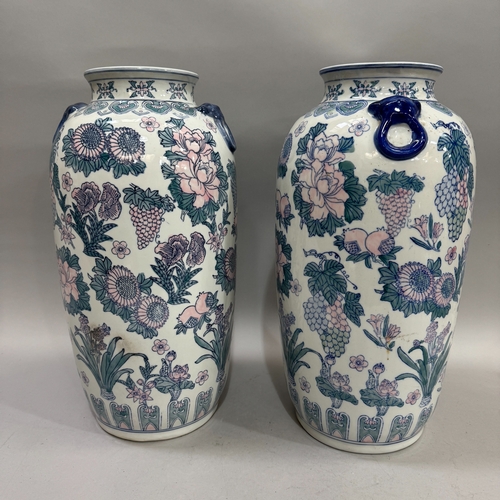 66 - A pair of reproduction vases in the Chinese taste, 36.5cm