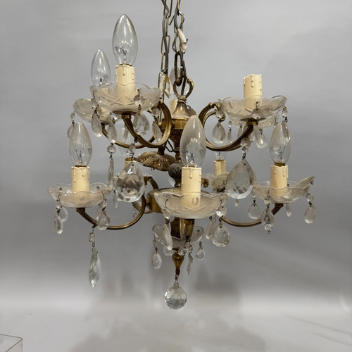 70 - A brass and glass two tier ten light chandelier