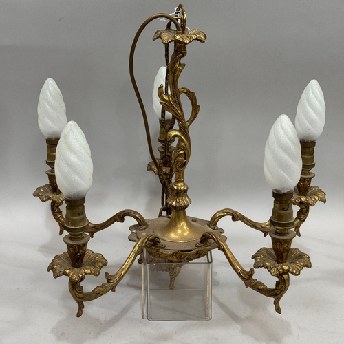 71 - A cast gilt metal five light electrolier of acanthus leaf design