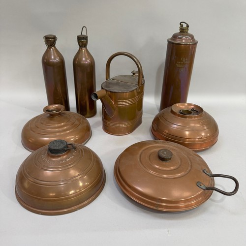 86 - Two copper flasks, a copper hot water flask, a hot water can and four copper bed warmers