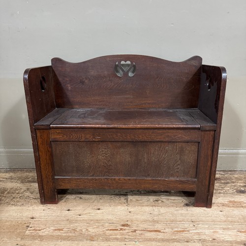 315 - An oak monks bench with lift up top