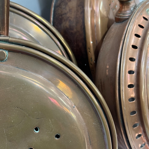 340 - Four 19th century copper bed warmers each on a turned wooden handle