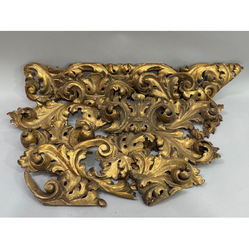 356 - A quantity of period gilt wood and gesso sections, carved and pierced with foliage