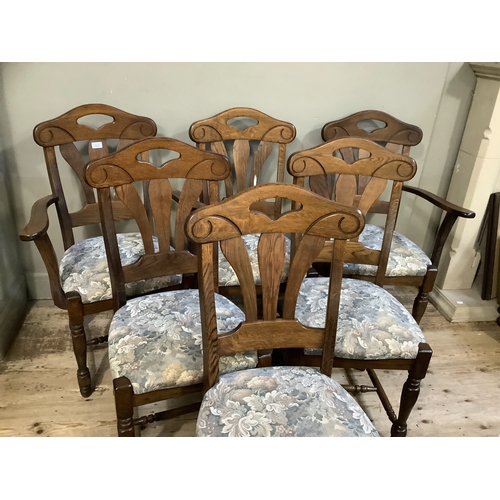 362 - A set of six oak dining chairs, four single and two carvers