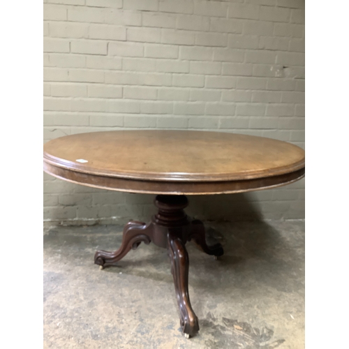 365 - A Victorian mahogany looe table, the mahogany circular tilt top on a tripod base