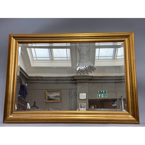 371 - A gilt framed rectangular wall mirror, bevelled glass, 73cm x 104cm