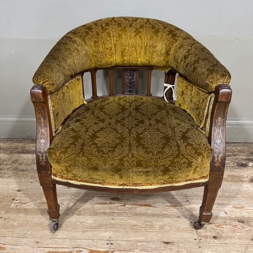 317 - An Edwardian mahogany inlaid tub chair