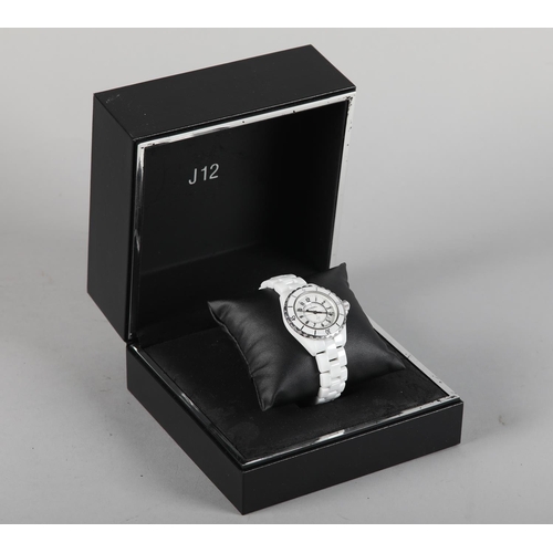 251 - A CHANEL LADY'S J12 WHITE CERAMIC AND STEEL QUARTZ WRISTWATCH No. L.H. 35117, white stepped dial wit... 