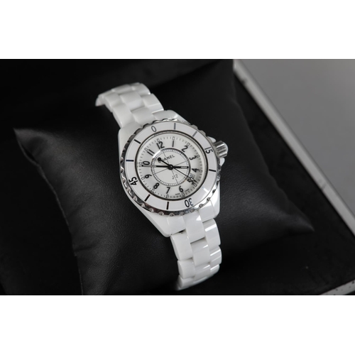 251 - A CHANEL LADY'S J12 WHITE CERAMIC AND STEEL QUARTZ WRISTWATCH No. L.H. 35117, white stepped dial wit... 