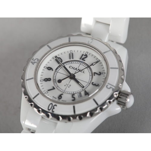 251 - A CHANEL LADY'S J12 WHITE CERAMIC AND STEEL QUARTZ WRISTWATCH No. L.H. 35117, white stepped dial wit... 