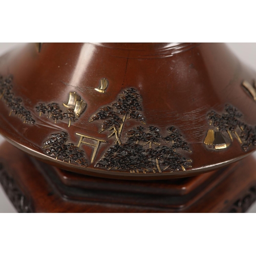 126 - MIYABE ATSUYOSHI OF KYOTO (Act 1850-1900) MEIJI PERIOD, A Japanese inlaid bronze vase of conical for... 