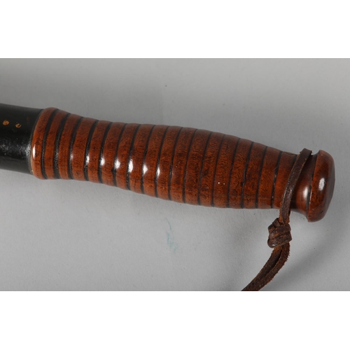 39 - AN EARLY 19TH CENTURY TRUNCHEON, probably George IV, painted and gilt with a crown over scroll work ... 