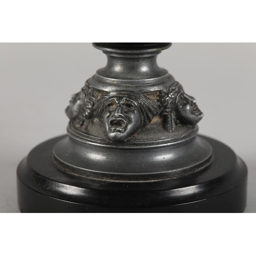 64 - A LATE 19TH CENTURY PEWTER TWO-HANDLED URN AND DOMED COVER with laurel wreath finial, reeded rim abo... 