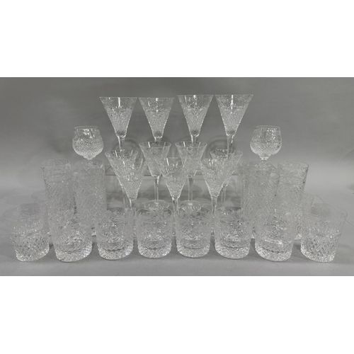 1 - A suite of Stuart glassware including four large wines 21cm, seven smaller wines 18cm, six highball ... 