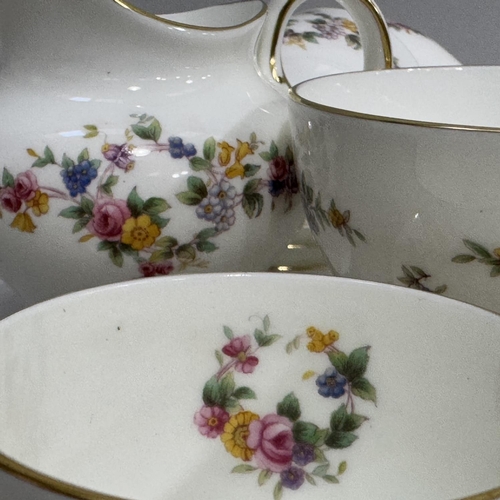 14 - A Minton's spring flowers coffee service of six coffee cups and saucers, sugar and cream