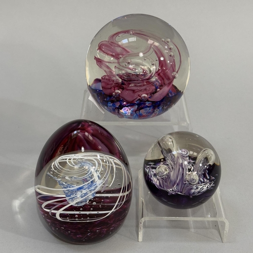 19 - Two Selkirk glass paperweights, Cabaret 1990 and Concerto 1993 together with a Caithness glass paper... 